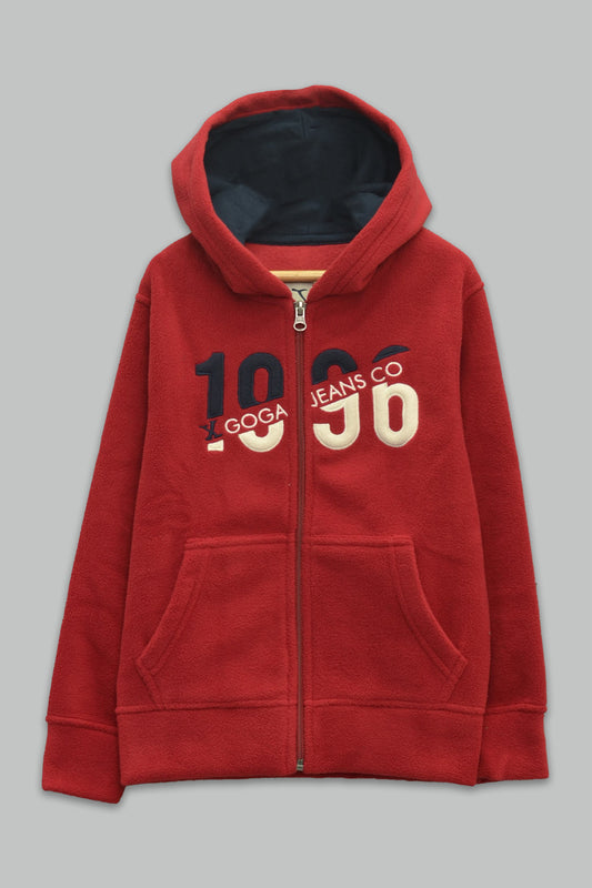 Sudadera polar para Niño bordada con manga larga, capucha ajustable, bolsas frontales y cierre.