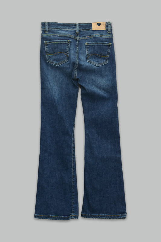 Pantalón acampanado de mezclilla para niña