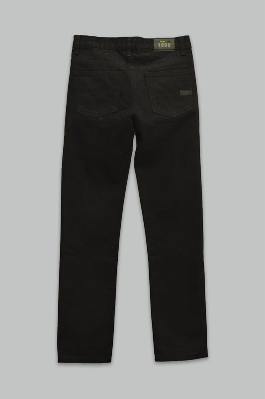 Pantalón Negro de mezclilla slim fit Rigido para niño