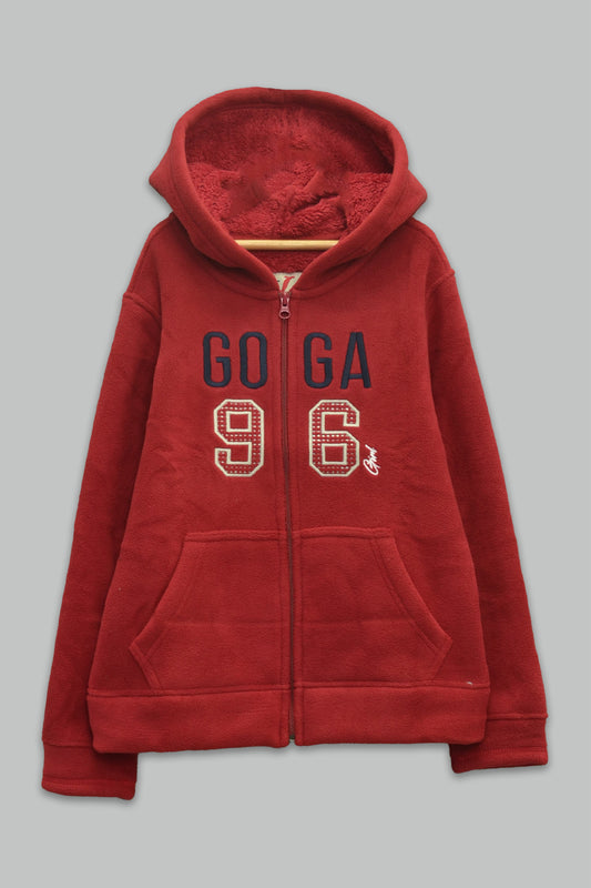 Sudadera sherpa niña bordada con manga larga, capucha ajustable, bolsas frontales y cierre