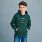 Sudadera felpa Niño bordada con manga larga, capucha ajustable, bolsas frontales.