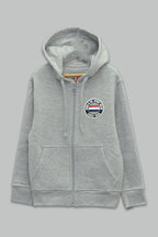 Sudadera felpa Niño bordada con manga larga, capucha ajustable, bolsas frontales y cierre.