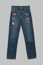 Pantalón de mezclilla Regular fit Stretch con escudos para niño