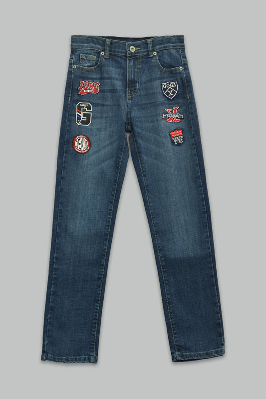 Pantalón de mezclilla Regular fit Stretch con escudos para niño