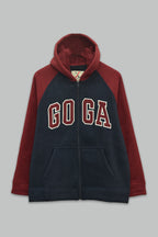Sudadera sherpa para hombre, bordada, con capucha ajustable, bolsas frontales y cierre.