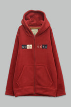 Sudadera sherpa niño bordada con manga larga, capucha ajustable, bolsas frontales y cierre.