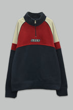 Sudadera polar para Niño bordada con manga larga, cuello alto, bolsas frontales y cierre.
