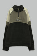 Sudadera polar para Niño bordada con manga larga, cuello alto, bolsas frontales y cierre.