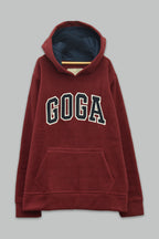 Sudadera polar para Niño bordada con manga larga, capucha ajustable, bolsas frontales y cierre.