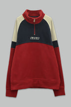 Sudadera polar para Niño bordada con manga larga, cuello alto, bolsas frontales y cierre.