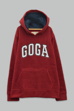 Sudadera polar para Niño bordada con manga larga, capucha ajustable, bolsas frontales y cierre.